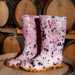 One of the winemakers boots in the barrel room during vintage.