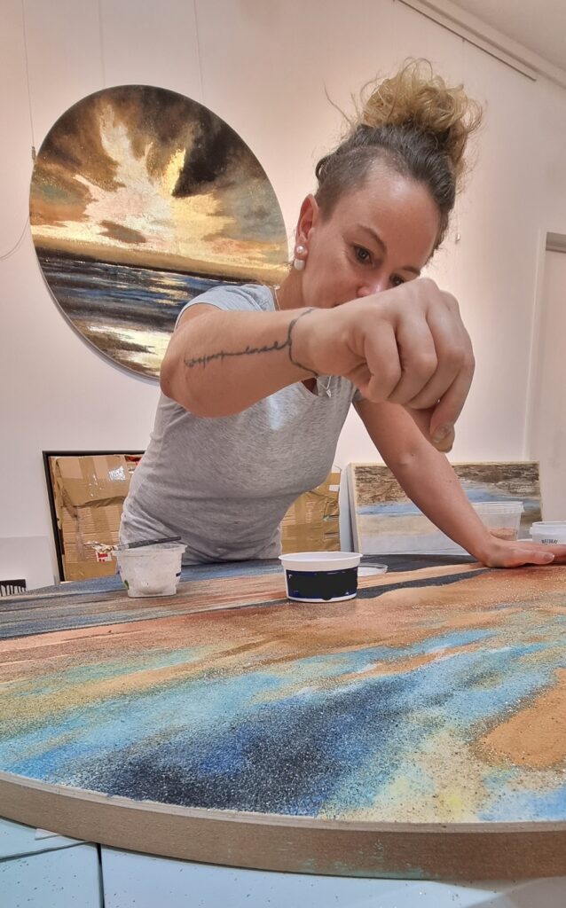 artist Nancy Tschetner working with sand 20220424 1000px